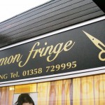 cinnamon fringe salon sign